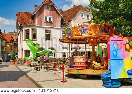 Bensheim, Germany - August 2021: Colorful Carousel And Information Booth For Political Party In Hist