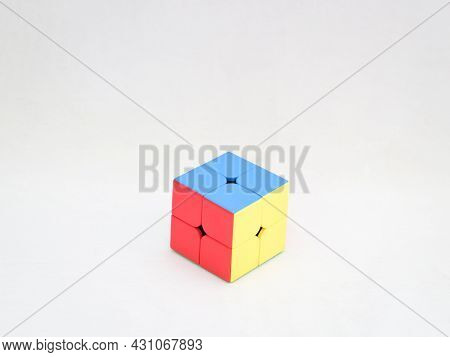 2x2 Puzzle Cube Used For Increasing Problem Solving Ability Isolated In A White Background