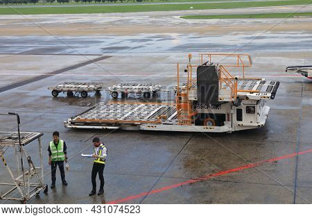 Don-mueang, Bangkok - May 2018 : Ground Support Equipment Standby For Services In Apron Near Aircraf