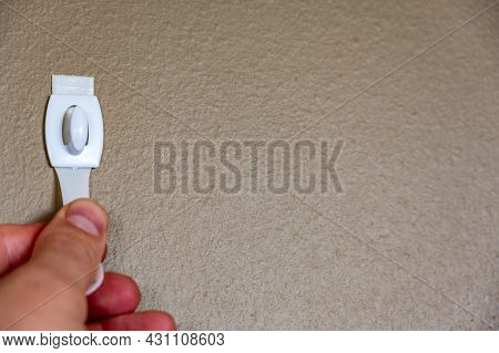 Selective Focus On Adhesive Strip Wall Hanger That Can Be Removed By Pulling Tape