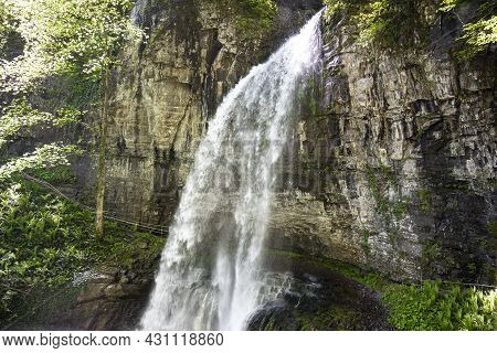 The Giant Waterfall In The Republic Of Abkhazia. A Clear Sunny Day On May 20, 2021
