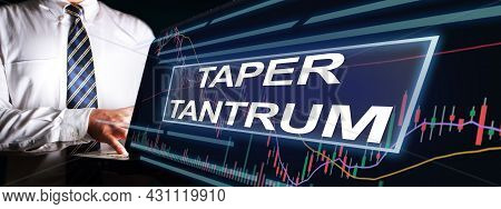 Taper Tantrum Concept, Global Economic World Market Reacting To The Fed Tapering Off. Word Text Typo