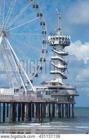 10 August 15, 2021, Scheveningen, The Hague , Netherlands, Amusement Park, With Ferries Wheel And Bu