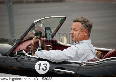 Bucharest, Romania - August 10, 2021: Classic Rally Driver Christian Hiver Is Driving An 1961 Austin