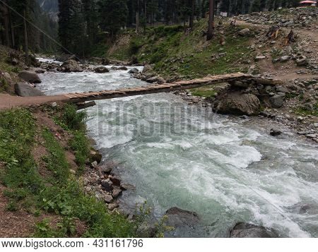 Wooden Bridge Over A River In A Village Of Kalam Swat Pakistan