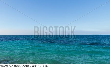 Landscape Image Of Turquoise Sea With Bright Sky Can Be Used As A Background Image