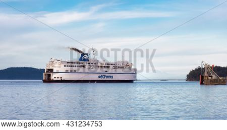 Victoria, Vancouver Island, British Columbia, Canada - August 9, 2021: Bc Ferries Boat Arriving To T
