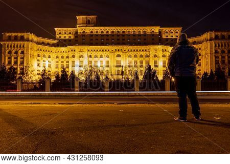 Man In Front Of Palace Of Parliament, Bucharest, Romania