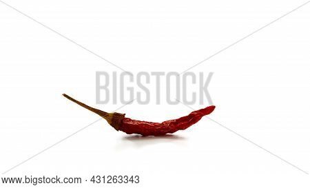 Dry Red Hot Chili Peppers On White Background