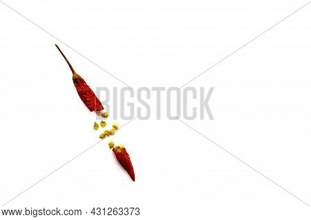 Dry Red Hot Chili Peppers On White Background