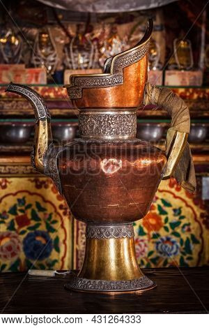Water vessel in Spituk Gompa Tibetan Buddhist monastery. Ladakh, India