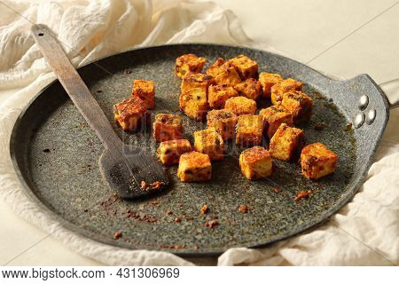 Kerala Style Spicy Chiken Roast Garnised With Caramalised Onions. Popular Name Is Kozhi Varuthathu. 