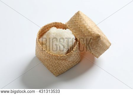 Steamed Sticky Rice Is In Bamboo Container On White Background.