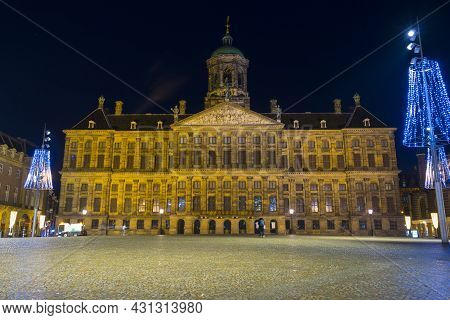 Amsterdam, Netherlands - Nov 29, 2019 : View Of Royal Palace Amsterdam And Dam Square At Night In Am