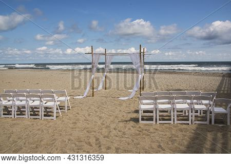 A Wedding Prepartion Is Set-up On The Beach At The Bouge Inlet Pier In Emerald Isle,north Carolina