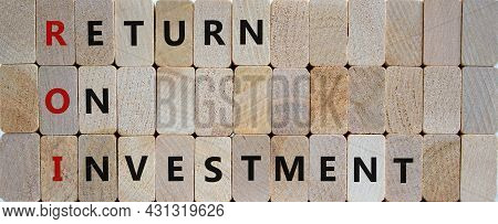 Roi, Return On Investment Symbol. Wooden Blocks With Words 'roi, Return On Investment'. Beautiful Wo