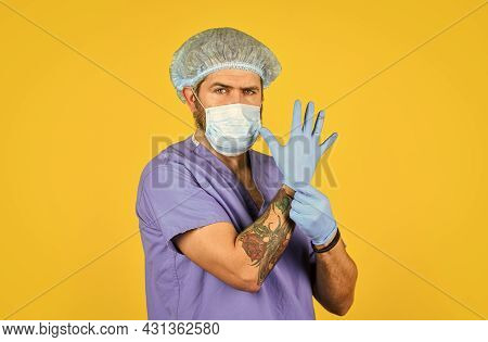 Experienced Doctor. Doctor Surgeon Wear Rubber Glove. Nurse In Respirator Mask. Medical Worker Ready