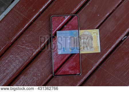 Ukrainian Banknote Hryvnya View Via Tablet Computer.