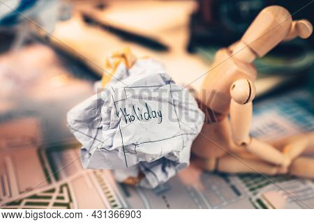 Crump Paper Calendar With The Word Holiday Written On. Cancel And Fail Plan Travel, Holiday, Vocatio