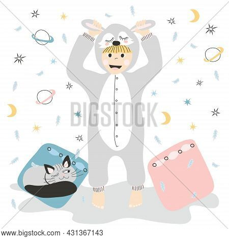 Child In Kugurumi Pajamas With A Cat And Pillows. Cute Baby In Pajamas On The Background Of Pillows 