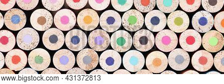 Closeup Of Many Unsharpened Multicolored Wooden Pencils Background