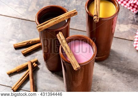 Traditional Mexican Atole Drink On Rustic Wooden Table