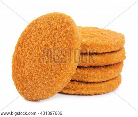 Uncooked Breaded Cutlets On White Background. Freshly Frozen Semi-finished Product
