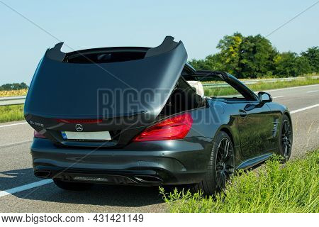 Dnepropetrovsk, Ukraine - 08.24.2021: Photos Of A Mercedes Benz Sl550 Convertible On The Road. Conve