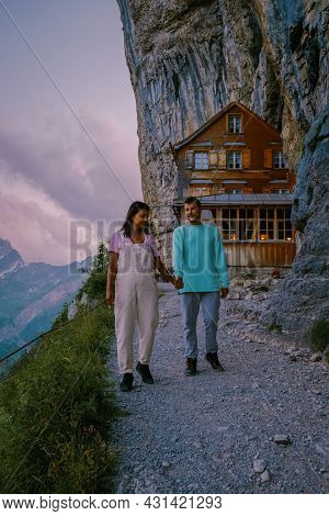 Swiss Alps And A Mountain Restaurant Under The Aescher Cliff Viewed From Mountain Ebenalp In The App