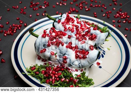 Chile En Nogada, A Traditional Dish From Puebla With The Addition Of Walnut Cream, Pomegranate Seeds