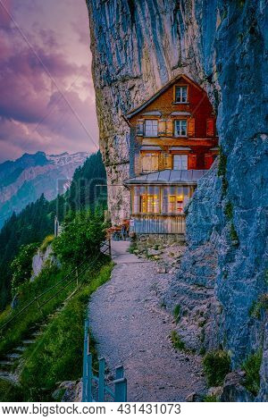 Swiss Alps And A Mountain Restaurant Under The Aescher Cliff Viewed From Mountain Ebenalp In The App