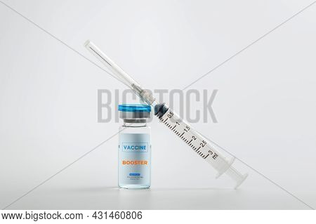Syringe With Liquid Vaccines Booster On White Background, Fight Against Virus Covid-19 Coronavirus, 