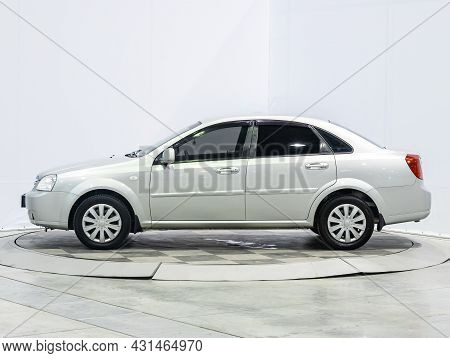 Novosibirsk, Russia - July 28, 2021: White Chevrolet Lacetti, Side View. Popular Car On A Parking
