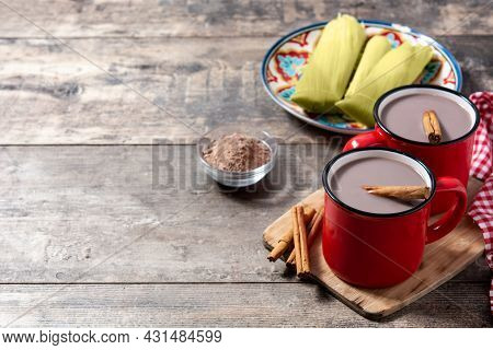 Traditional Mexican Chocolate Atole Drink On Wooden Table.copy Space