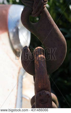 Close-up Of An Old Rusty Massive Hook Of An Old Tow Truck