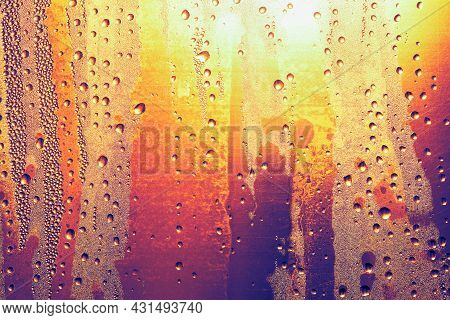 Condensation On The Beer Bottle . Water Drops On The Glass . Cold Drink