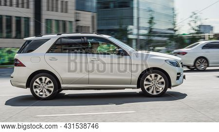 White Mercedes-benz Ml Class W166 Suv Car Moving On The Street. Moscow, Russia - August 2021