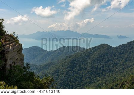 View Of The Lush Green Tree Canopy Of The Tropical Rainforests And Some Islands In The Distance