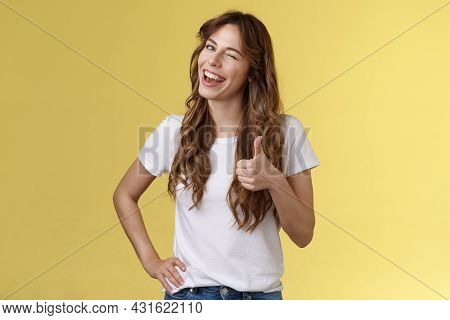 I Support You Guys Good Luck. Happy Cheerful Cheeky Attractive Girl Wink Approval Like Show Thumb Up