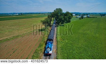 Ronks, Pennsylvania,june 2019 - Aerial Head On View Of Thomas The Tank Engine Approaching Thru Trees