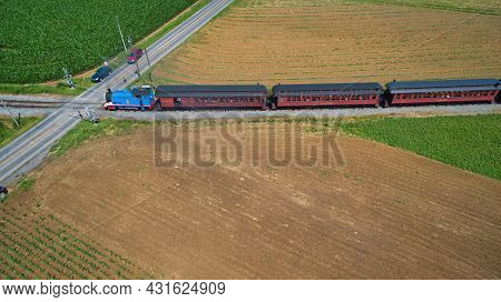 Ronks, Pennsylvania,june 2019 - Aerial View Of Thomas The Tank Engine Approaching Thru Trees And Far