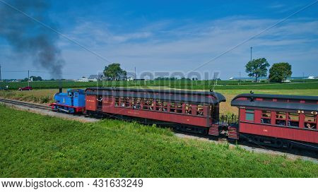 Ronks, Pennsylvania,june 2019 - Aerial View Of Thomas The Tank Engine Approaching Thru Trees And Far