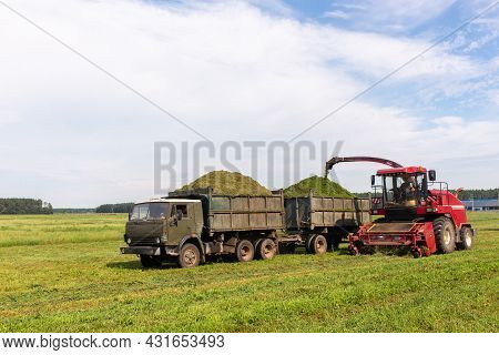 Combine Harvesting A Green Field