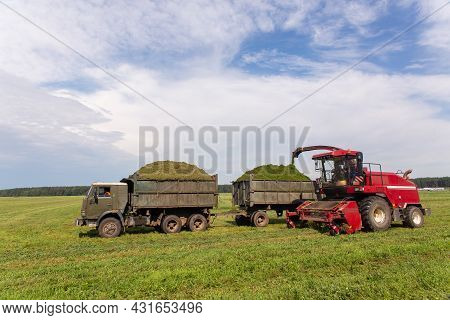 Combine Harvesting A Green Field