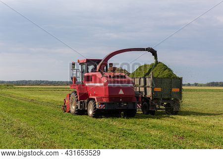 Combine Harvesting A Green Field