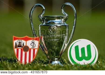 August 27, 2021 Seville, Spain. The Emblems Of Football Clubs Sevilla Fc And Vfl Wolfsburg And The U
