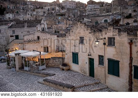 Matera, Italy - September 20, 2019: Evening View Of The City Of Matera, Italy, With The Colorful Lig