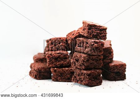 Extream Close Up Shot Of Stack Homemade Chocolate Brownies Cracker, Pieces Of Fresh Brownie On White