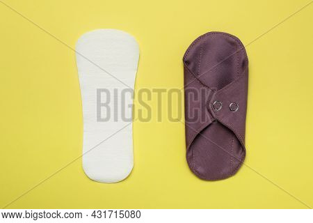 Pantyliner And Reusable Cloth Menstrual Pad On Yellow Background, Flat Lay