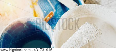 The Concept Of Repair Of The House And Premises. Buckets Of Paint And Lime For Whitewashing And Pain